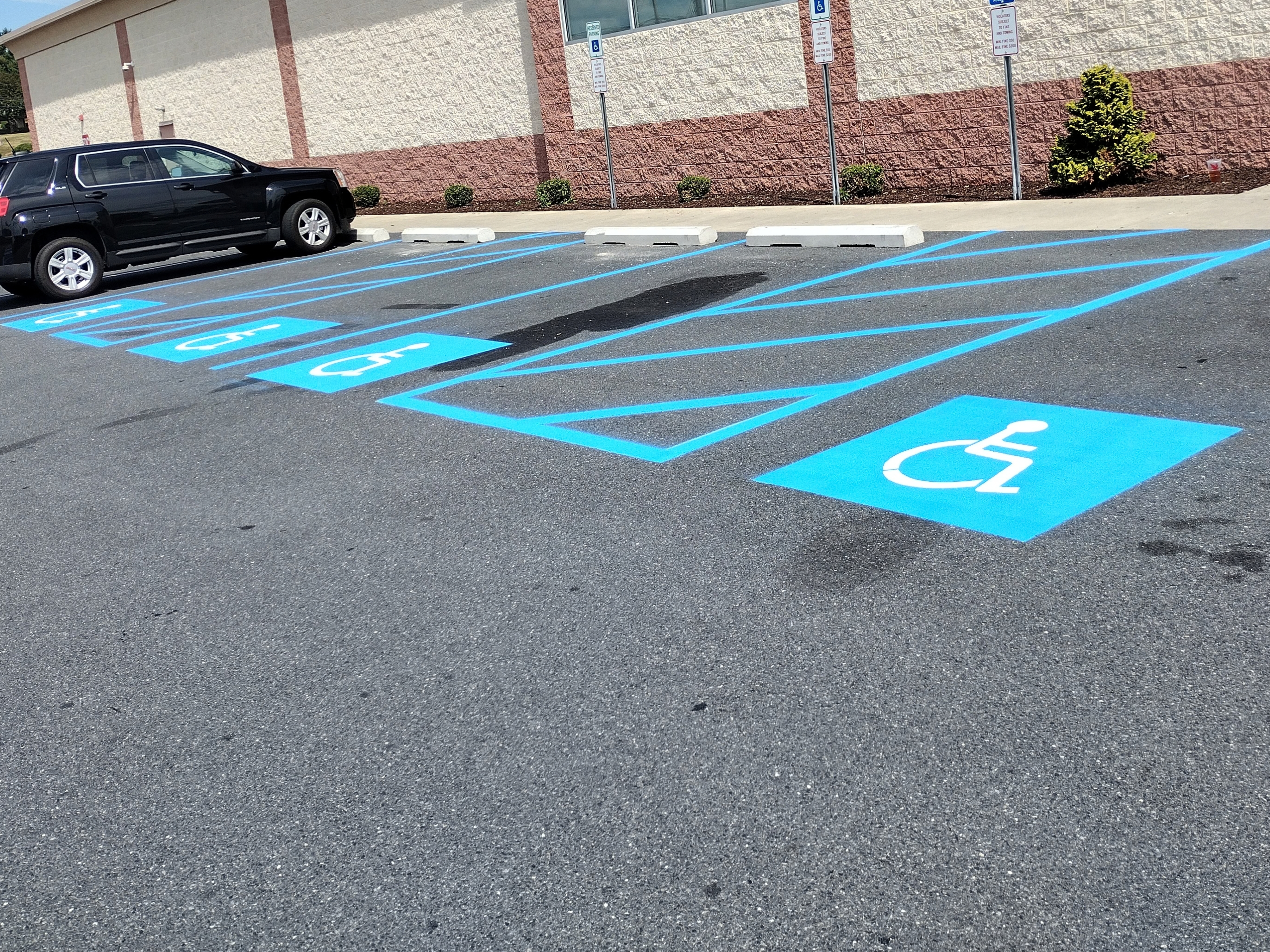 Accessible parking spaces and pavement markings at CVS Pharmacy